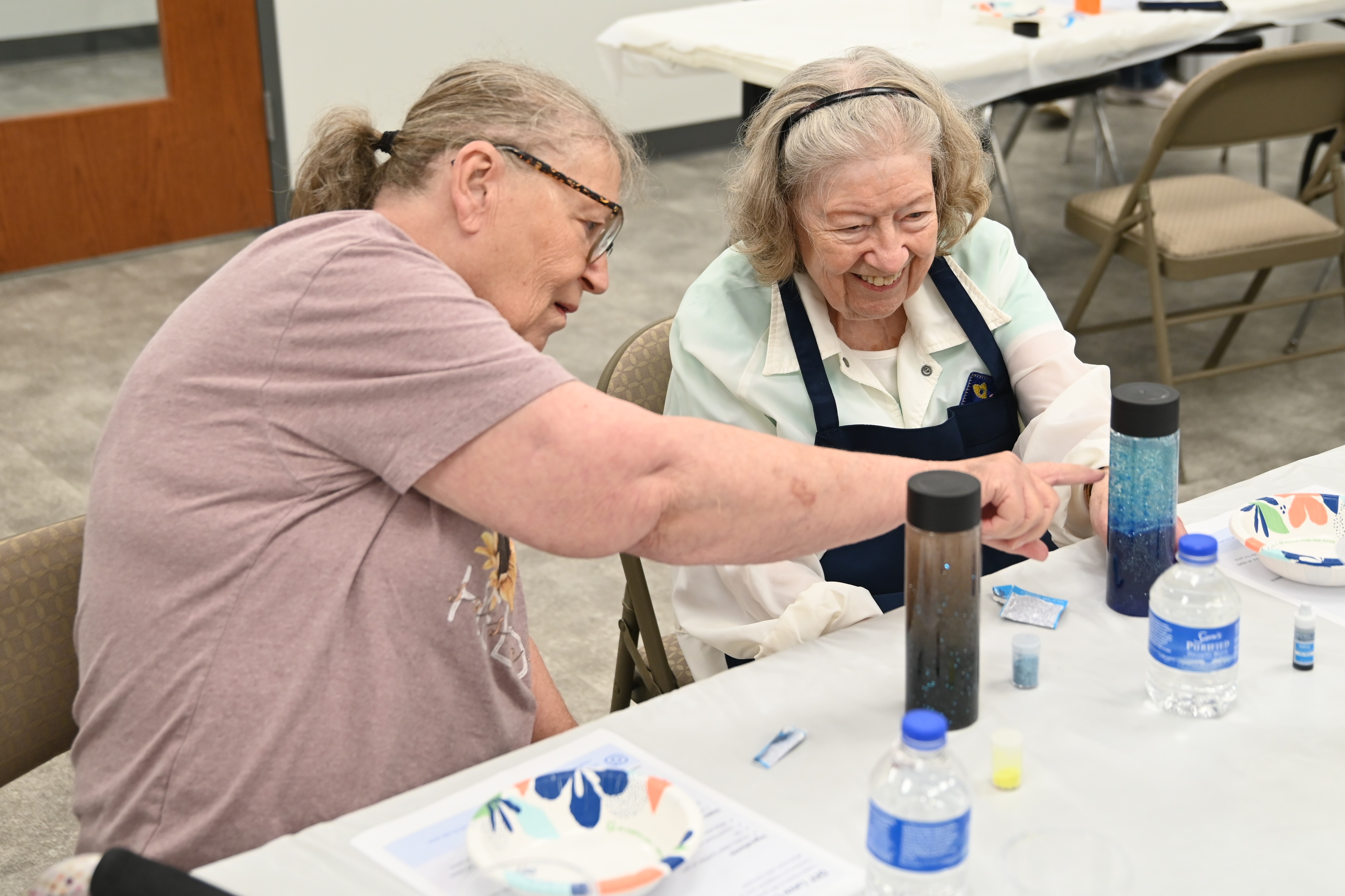Patrons work on their lava lamps during a BCPL on the Road program in Junction City.