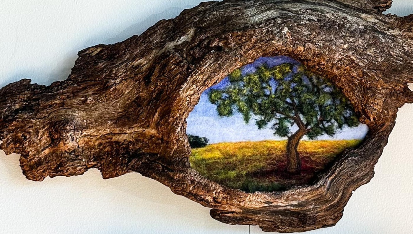 needle felting image with drift wood frame